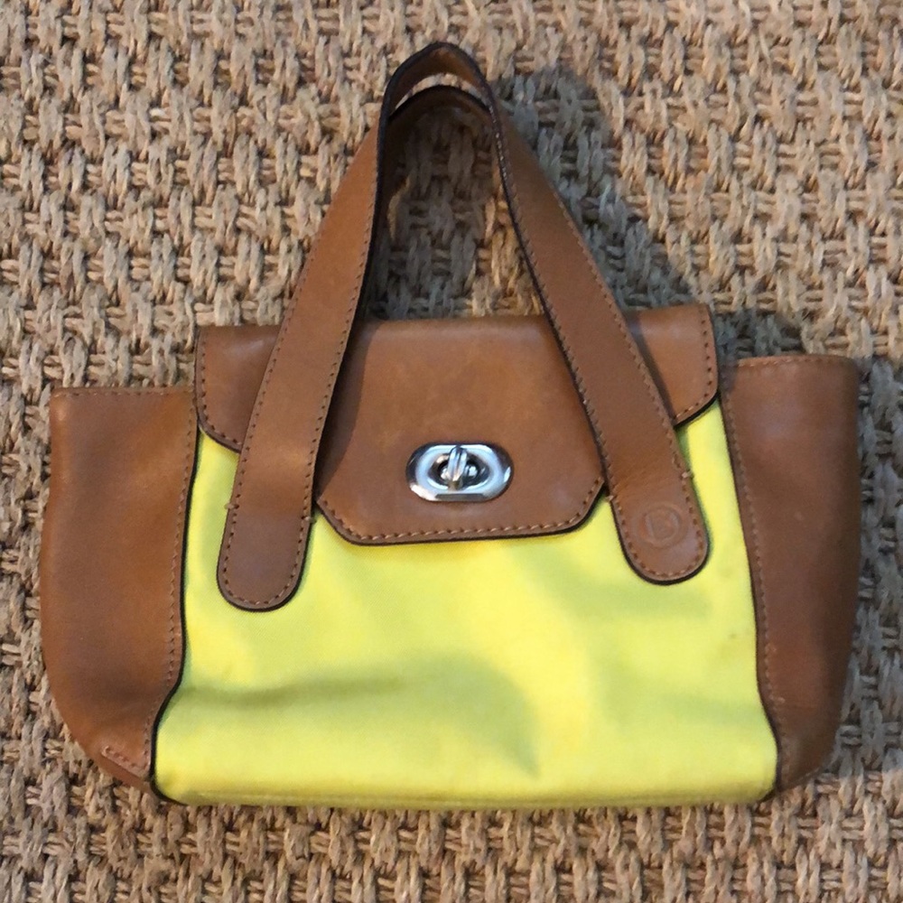 Micro neon green and tan purse.